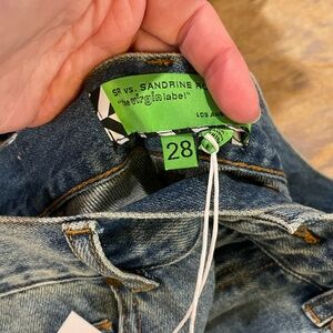 Sandrine Rose/Free People size 28NWT. Wide leg baggy fit.